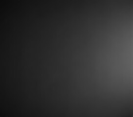 Subtle charcoal grey to black ombre on smooth surface, color, style, hue