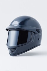 Fototapeta premium lone paintball helmet rests in center of white background