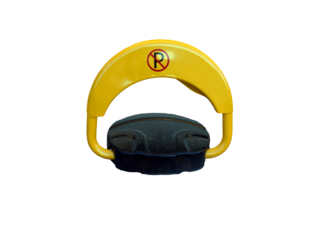 A bright yellow parking blocker features a sturdy design meant for city streets. It serves to restrict unauthorized parking, ensuring proper use of designated spaces and improving traffic flow.