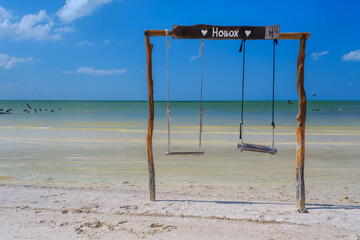 Holbox beach swings