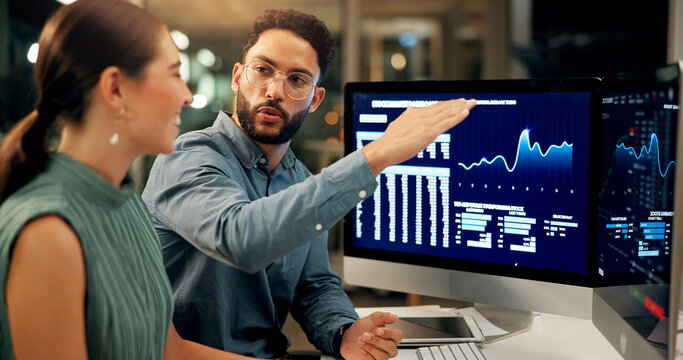 Business people, stock market and night with computer for profit, financial growth or increase at office. Businessman, woman or brokers with tech screen or display for online trading or investment