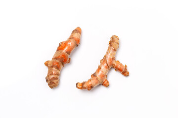 Dry Turmeric powder and turmeric root isolated on white background ,Top view.