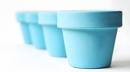 Three Light Blue Painted Terracotta Pots Row