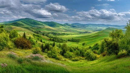 Fototapeta premium Lush Green Valley Landscape Under Partly Cloudy Sky