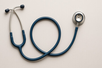  High-resolution image of a medical stethoscope on a clean white surface, symbolizing healthcare and diagnostics.
