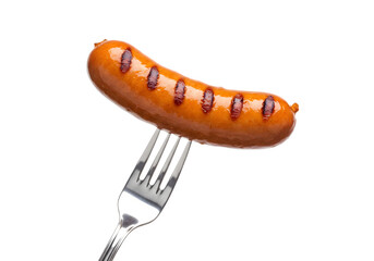 Grilled sausage on a fork. Delicious and savory!