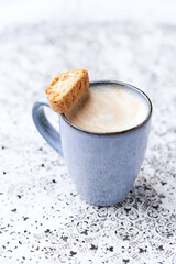 Cappuccino on bright background. Soft focus. Copy space	
