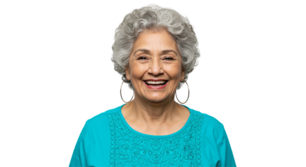 Joyful elderly Hispanic woman with gray hair and hoop earrings, wearing a bright turquoise top, smiling warmly in front of a black background, embodying happiness and resilience.