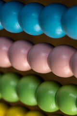 colorful wooden beads on abacus for children's play, wooden children's abacus for learning and development