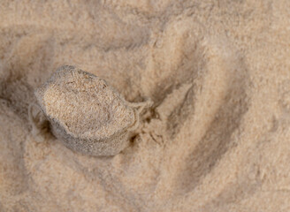 wheat flour with bran in a linen bag, fresh wheat flour close-up, flour for making bread with bran