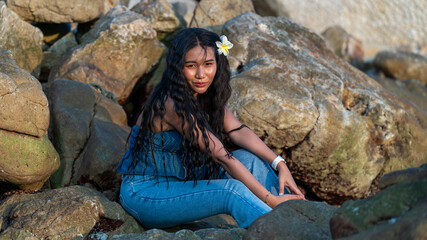Girl at Beach and on rocks at beach