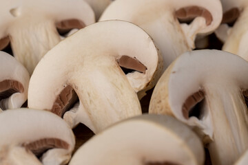 cut champignons unpeeled from the ground, preparation of the harvested mushroom champignons for cooking