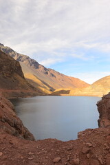 Cajon del Maipo - Embalse el Yeso area. San jose de Maipo, close to Santigao area. Lake view with mountains in the background. The lake is beautiful with unreal, scenic nature views on a sunny day.