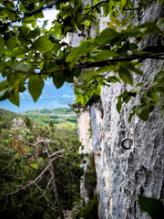 Climbing Bolt Installed On A Rock Face At Nago Climbing Base Camp Overlooking Garda Lake, Italy
