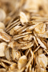flakes from which porridges and other healthy dishes are prepared, products for quick cooking of oat grain dishes, side view