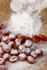 candied fruits of kumquat boiled in sugar syrup in powdered sugar, sweet dehydrated candied fruits of kumquat