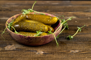 ripe cucumbers marinated with salt and spices, pickled cucumbers during cooking