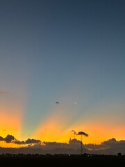 Fototapeta premium beautiful evening sky, natural blue orange gradient background, light to dark transition atmosphere