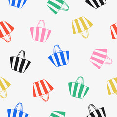 Colorful striped beach bags seamless pattern on white background. Summer vacation and travel concept. Design for textile, wallpaper, poster, print