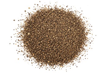 A top view close up of a pile of ground black pepper on a white surface with a centered composition