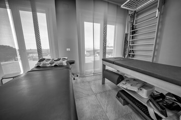 Well-equipped physiotherapy center with medical beds and advanced rehabilitation devices