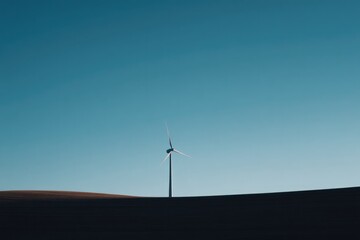 Obraz premium minimalistic image featuring solitary turbine standing tall against clear blue sky emphasizing its sleek design with