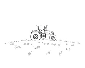 Tractor in a grassy field ready for agricultural farm work