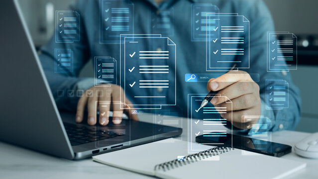 Close-up businessman writing down digital document.Document law regulation and compliance rules.Document of standards, regulations,requirements and compliance concept.