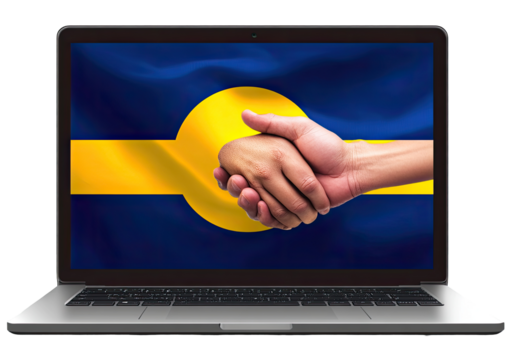 Handshake on laptop screen displaying a flag