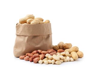 Fresh unpeeled peanuts in paper bag and peeled ones isolated on white