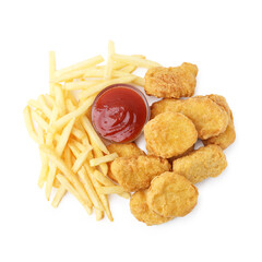 Naklejka premium Tasty chicken nuggets and french fries with sauce isolated on white, top view