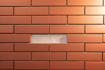 Old Red Brick Wall Background with Textured Surface and Brick Pattern