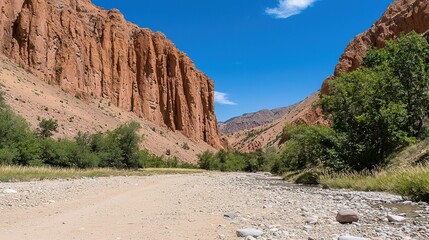 Fototapeta premium Stunning desert canyon under a clear sky.