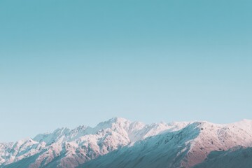 minimalistic photo of mountains with expansive sky conveying solitude and tranquility