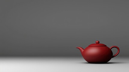 A solitary, polished red teapot on a neutral background.