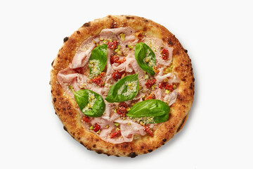 Delicious pizza with mortadella, pistachios, sun-dried tomatoes and basil on white background