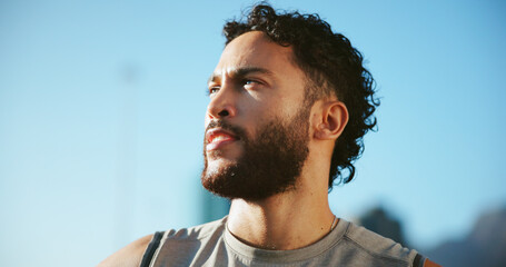 Break, runner or man in city thinking of fitness, marathon training or exercise health. Low angle, ideas or athlete in urban town for workout performance, outdoor jog or sports challenge in France © Fanti/peopleimages.com