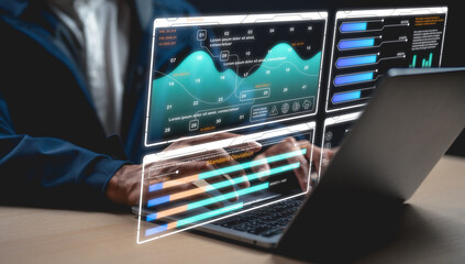 A professional analyzes digital data charts on a laptop, visualizing graphs and statistics through futuristic transparent screens.