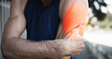 Man, arm pain or exercise overlay in city, muscle cramps or tension with fitness mistake....
