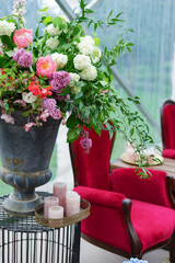 garden decorated with flowers and vintage furniture