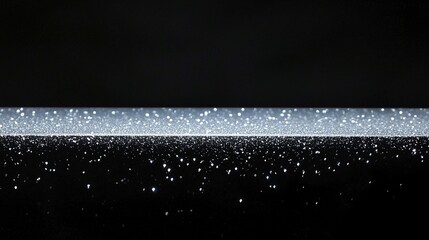 Abstract design with glittering, horizontal line.