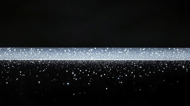 Abstract design with glittering, horizontal line.