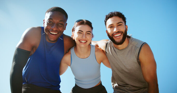 Fitness, portrait and team with routine, outdoor and wellness with personal trainer in morning and break. Blue sky, hug and people with muscle in city, healthy and friends with sportswear in Canada