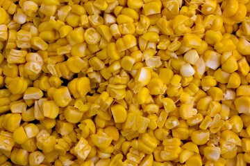 Yellow sweet corn kernels on the as a background, texture and background.