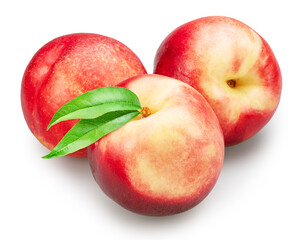 Ripe nectarines with leaves isolated on white background. File contains clipping path.