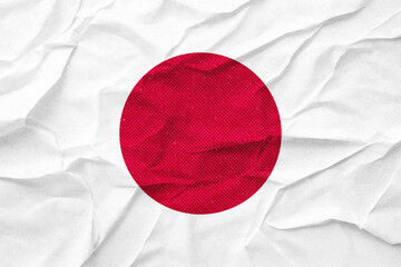 japan Abstract textured backdrop featuring a vibrant red circle on a white crumpled paper surface.