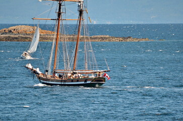 Fototapeta premium A Topsail Schooner on the Pacific coastline near Vancouver, BC, Canada
