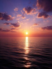Fototapeta premium Colorful sunset over calm ocean waters provides serenity