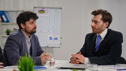 Two Businessmen on Business Project in Office Setting