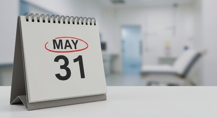 Standing flip calendar with red circle on May 31. Blurred hospital background. World No Tobacco Day, Memorial Day, National Save Your Hearing Day, Necrotizing Fasciitis Awareness Day, World foster day